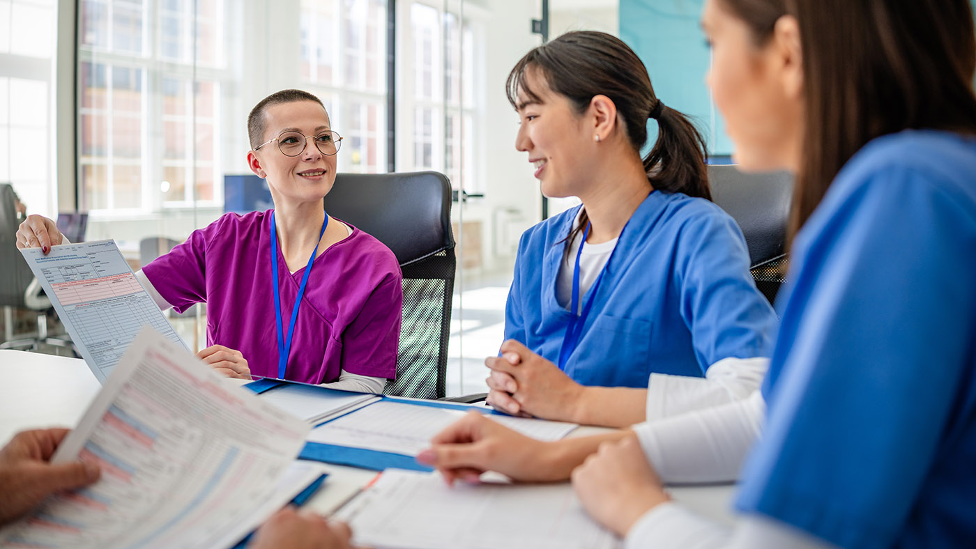 Interdisciplinary team works together on trauma-informed care plans in a skilled nursing faciity.